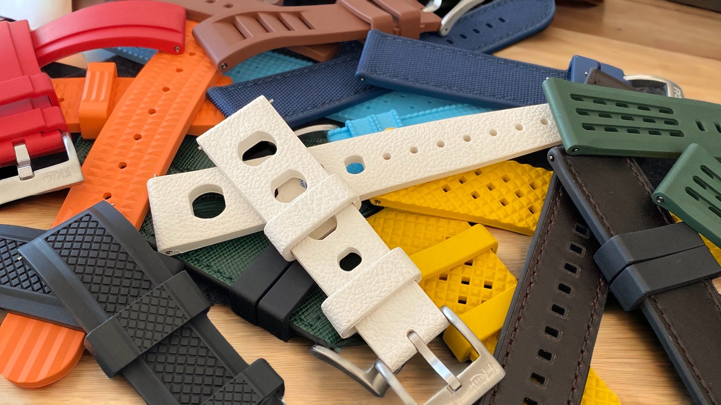 FKM Watch Straps in a pile